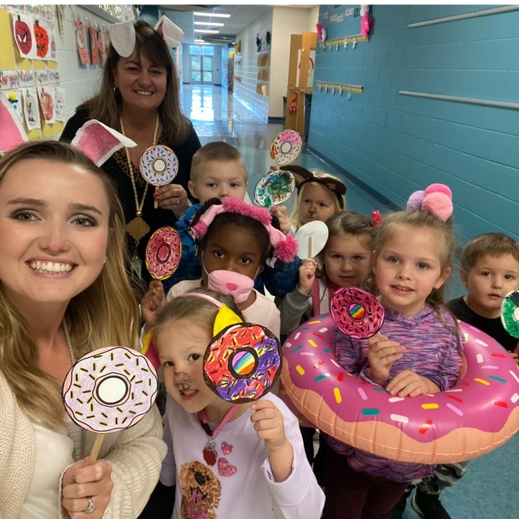 Mrs. Lord’s K4 classes having a blast in the book character parade! If you give a dog or a pre-k student a donut they might just have the best Halloween ever!