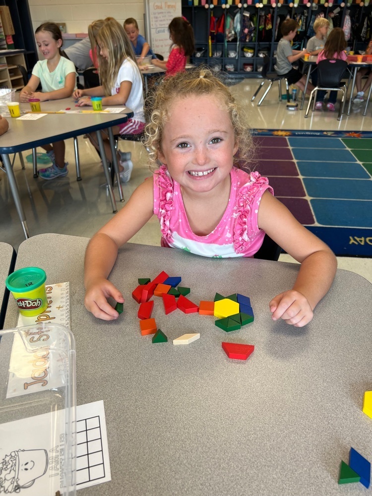 Mrs. Eberhart’s class exploring their math manipulatives they will be using this year as tools to help them learn!