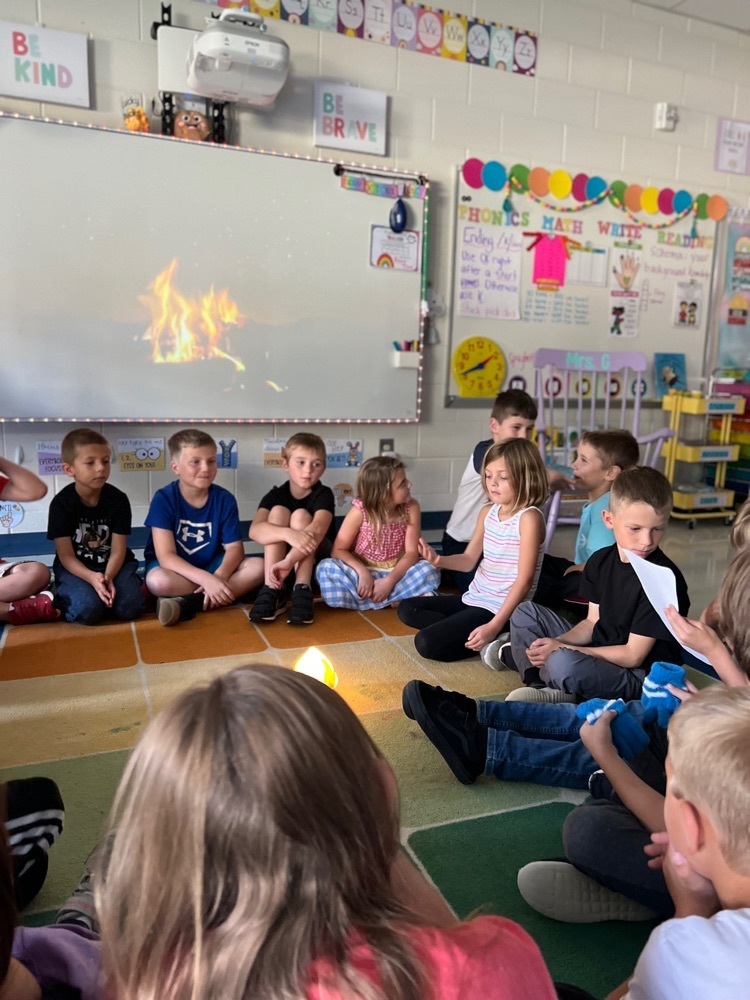 Today in Mrs. G’s class we shared our personal narrative writings around a campfire to keep warm! Students shared their writings by flashlight!