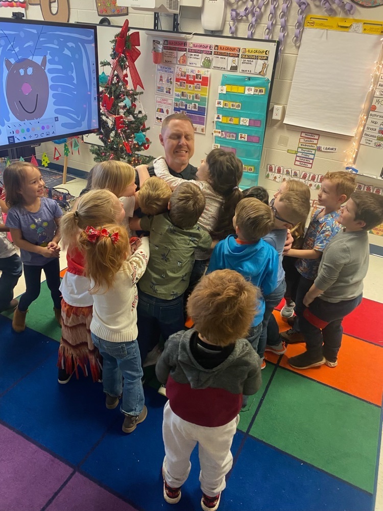 Mr. Chapman enjoyed taking time on Tuesday to read to pre-K, K5 and 1st grade students. Some classes showed their love with a big group hug!